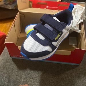 Brand new never worn puma sneakers .